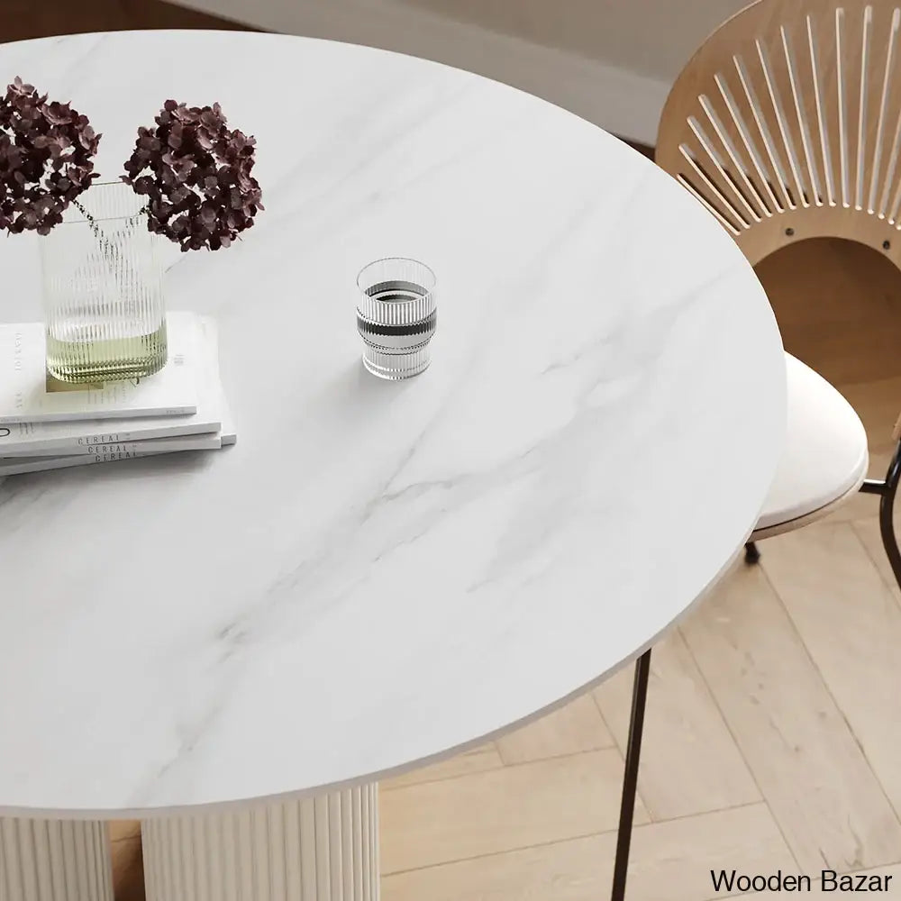 Darleen Modern Oval Dining Table With White Sintered Stone Top And Three Sleek Legs