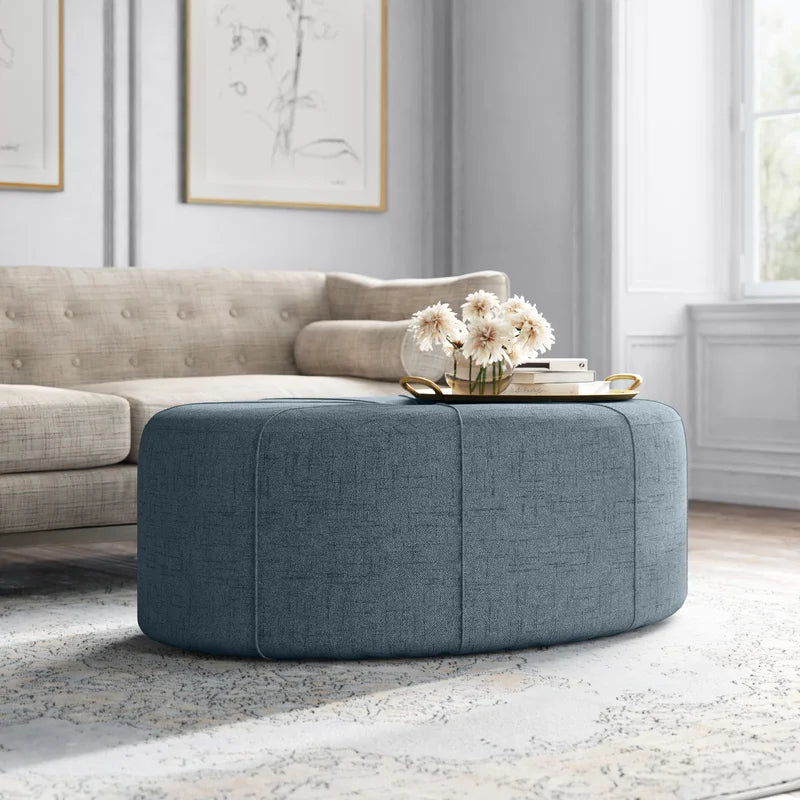 Oval tufted cocktail ottoman deals